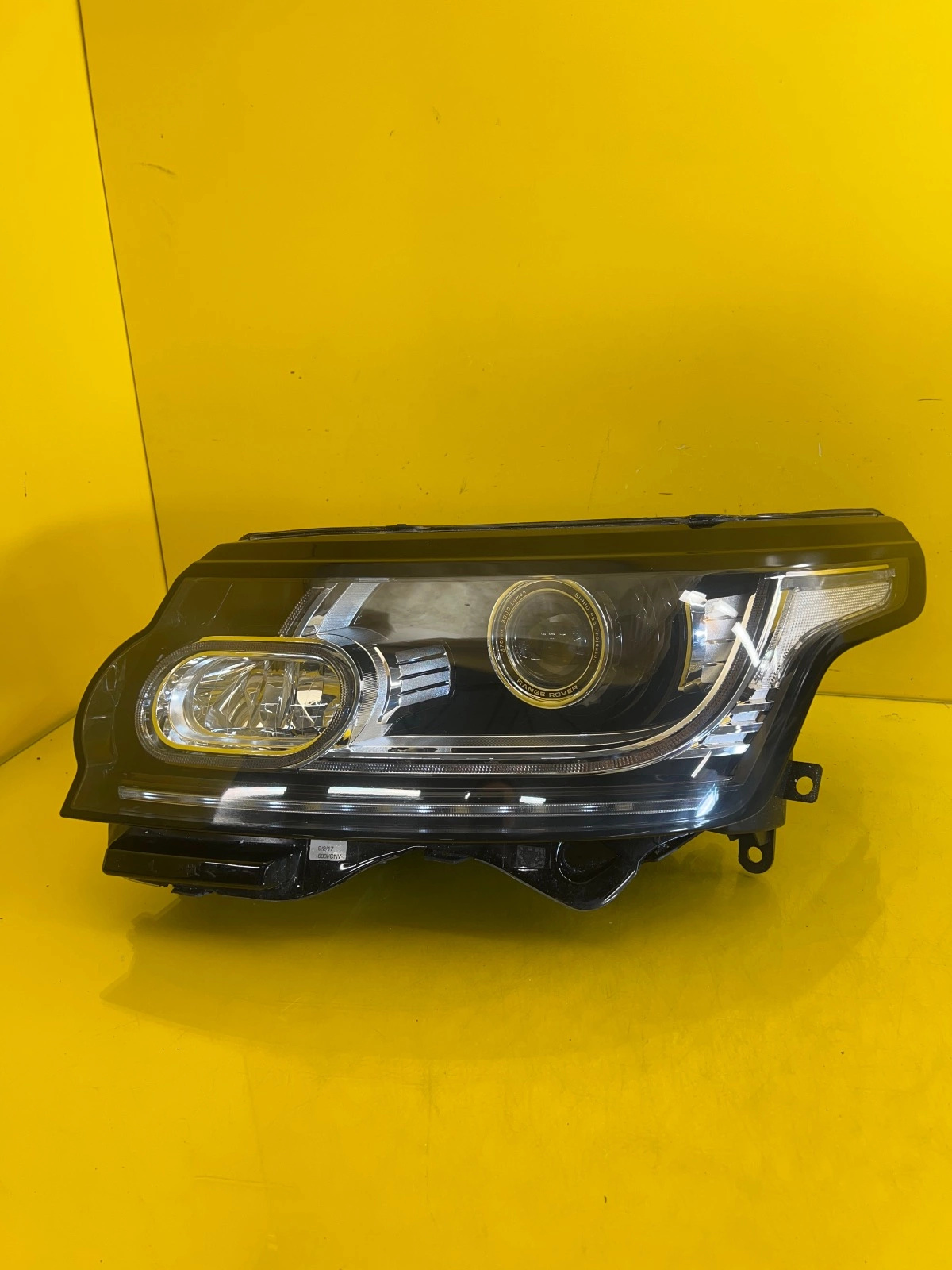 Far stânga Bi-Xenon OEM 24585