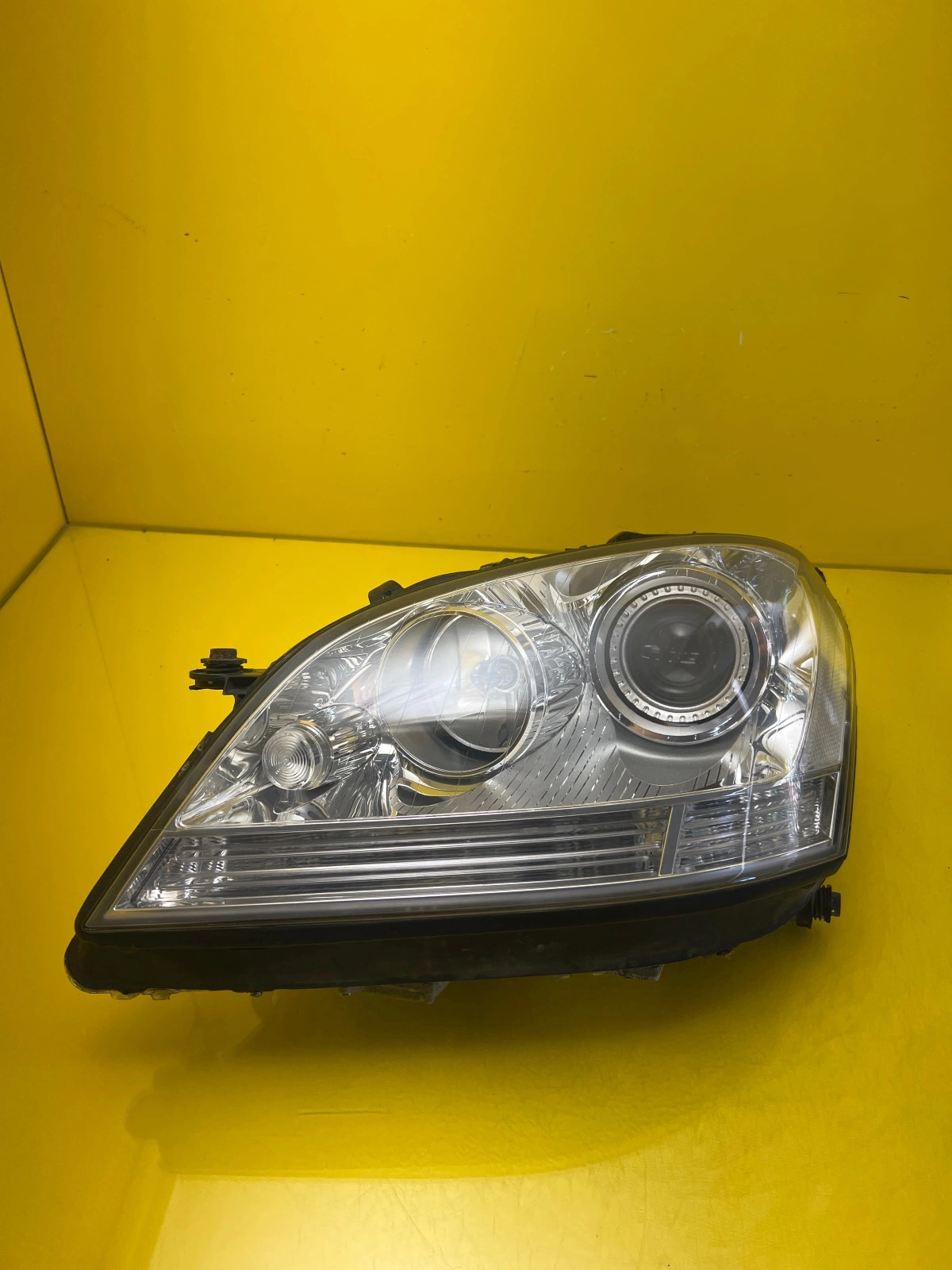 Far stânga Xenon OEM 26077