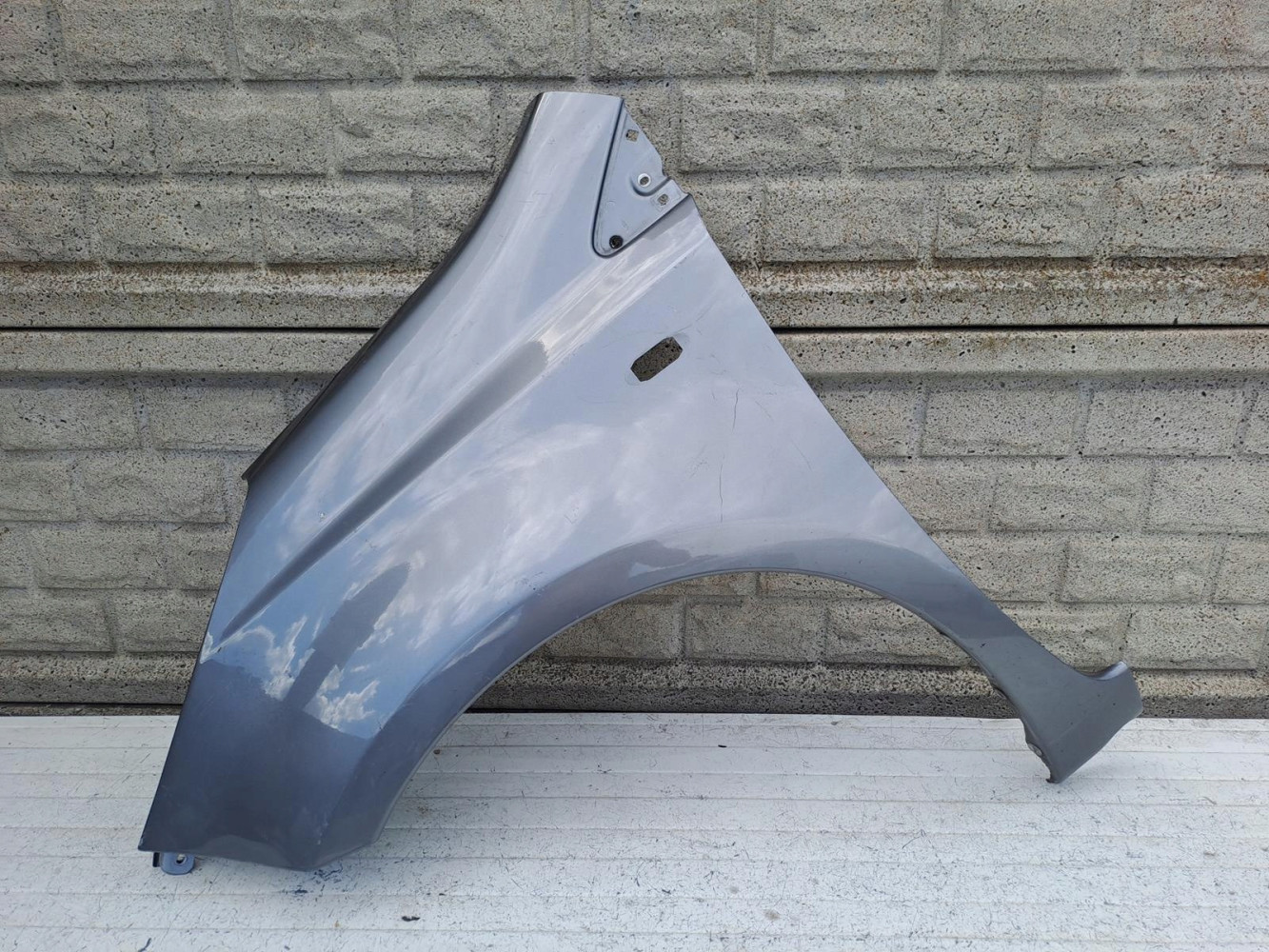 Aripa fata stanga Nissan Note 2006 2012